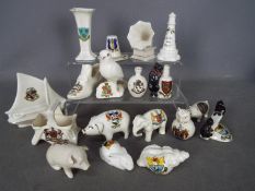 A collection of crested ware, eighteen pieces in total,