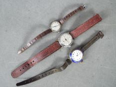 Lot to include a silver cased wristwatch, dial signed Thomas Russell & Son,