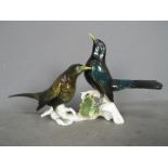 KARLS ENS, VOLKSTEDT, PORZELLANFIGUR - A figurine depicting two birds on a branch,
