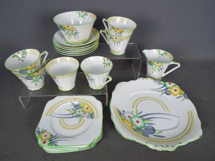 An Art Deco tea service by Bell China, of conical form,