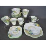 An Art Deco tea service by Bell China, of conical form,