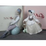 Nao - Two boxed figurines comprising Faithful Friend # 1650 and one of a Milk Maid # 0494,