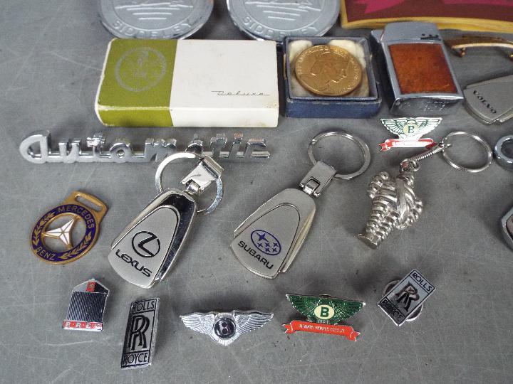 Automobilia - A collection of car badges, motoring related keyrings and pin badges, - Image 3 of 6