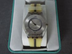 A gentleman's Swatch watch,