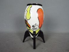Lorna Bailey - A Rocket vase in the Hillside Cottage pattern, signed,
