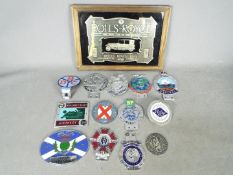 Automobilia - A collection of various car badges and a Rolls Royce advertising mirror.