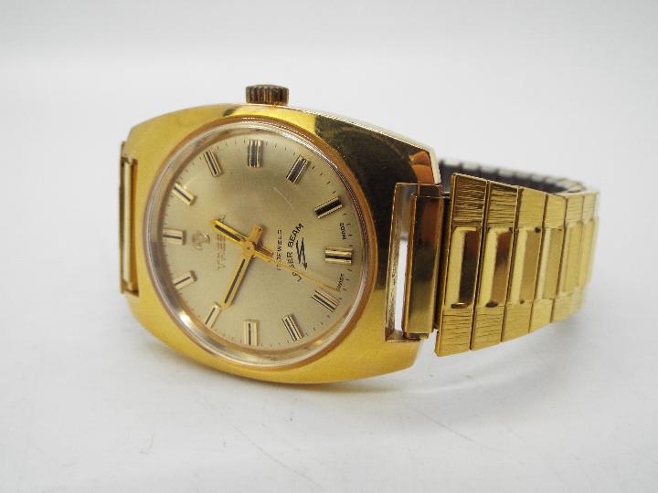 A Tressa Laser Beam gold plated wristwatch on gold plated expanding bracelet and a similar Ingersol - Image 3 of 3