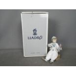 Lladro - A boxed figurine entitled Pierrot In Preparation, # 6257, approximately 15 cm (h).