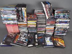 A large quantity of CD's and DVD's.
