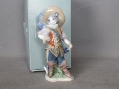 Lladro - A boxed figurine entitled Puss In Boots, # 8599, approximately 22.5 cm (h).
