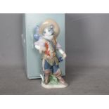 Lladro - A boxed figurine entitled Puss In Boots, # 8599, approximately 22.5 cm (h).