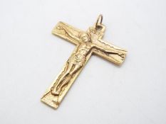A 9ct gold crucifix pendant, 4.4 cm x 3.4 cm, approximately 8 grams all in.