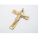 A 9ct gold crucifix pendant, 4.4 cm x 3.4 cm, approximately 8 grams all in.