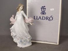Lladro - A boxed figurine entitled Spring Splendor, # 5898,