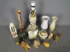 A collection of stone carvings, onyx, etc.
