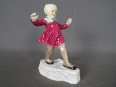 Royal Worcester - a Royal Worcester figurine entitled January,