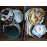 Two boxes of mixed ceramics, predominantly plates.