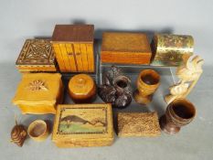 A collection of treen, trinket boxes, Japanese puzzle box and similar.