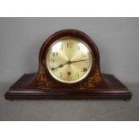 A Napoleons hat mantel clock with Chinoiserie decoration and Westminster chimes,