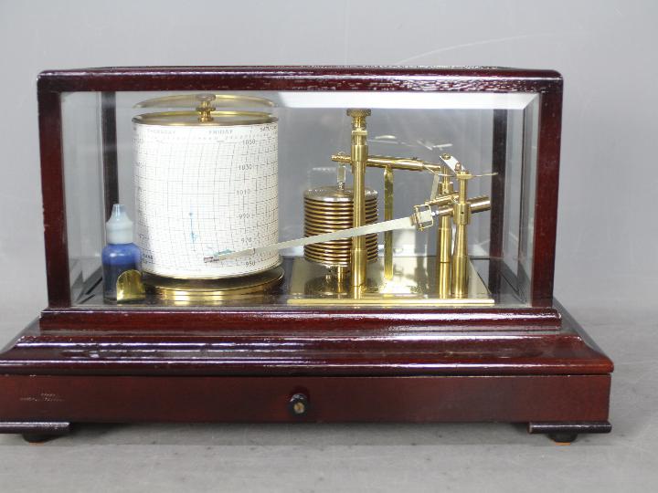 A mahogany cased, gilt brass barograph by F Darton & Co Ltd,