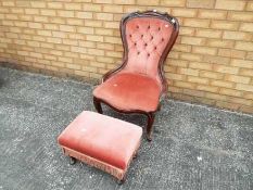A button back bedroom chair with footstool,