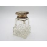 A George V cut glass and silver topped dressing table scent bottle, with stopper,
