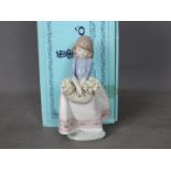 Lladro - A boxed figurine entitled May Flowers, # 5467,