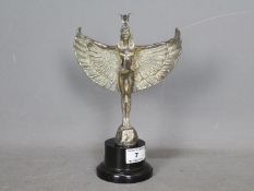 Automobilia - A car mascot depicting a winged Isis, mounted to plinth,