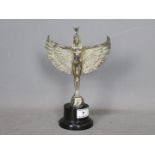 Automobilia - A car mascot depicting a winged Isis, mounted to plinth,