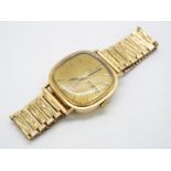 A gentleman's 9ct gold cased Rotary wristwatch on 9ct gold bark effect strap,
