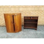 A bow fronted cabinet 94 cm x 67 cm x 44 cm and a two drawer hall cabinet 77 cm x 76 cm x 29 cm.