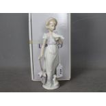 Lladro - A boxed Collectors Society figurine, 1991, entitled Summer Stroll # 7611,