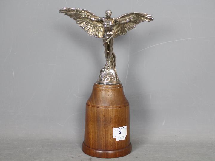 Automobilia - A Finnigans Icarus car mascot designed by Colin George, mounted to wooden plinth, - Image 8 of 11