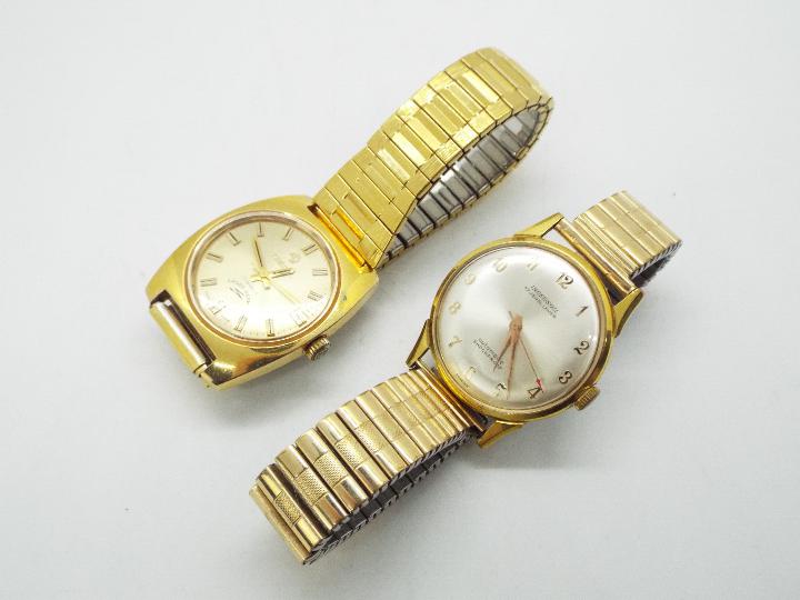 A Tressa Laser Beam gold plated wristwatch on gold plated expanding bracelet and a similar Ingersol
