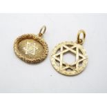 Two 9ct gold Star of David pendants, approximately 6.