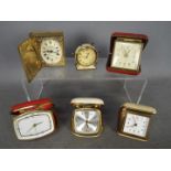 A collection of 6 travel alarm clocks, to include models by Smiths and Europa.