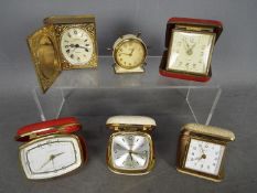 A collection of 6 travel alarm clocks, to include models by Smiths and Europa.