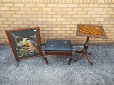 A chessboard table 70 cm x 46 cm x 46 cm, an embroidered fire screen and a stool.