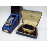 Two vintage digital watches comprising a gold plated Rotary and a stainless steel Texas Instruments