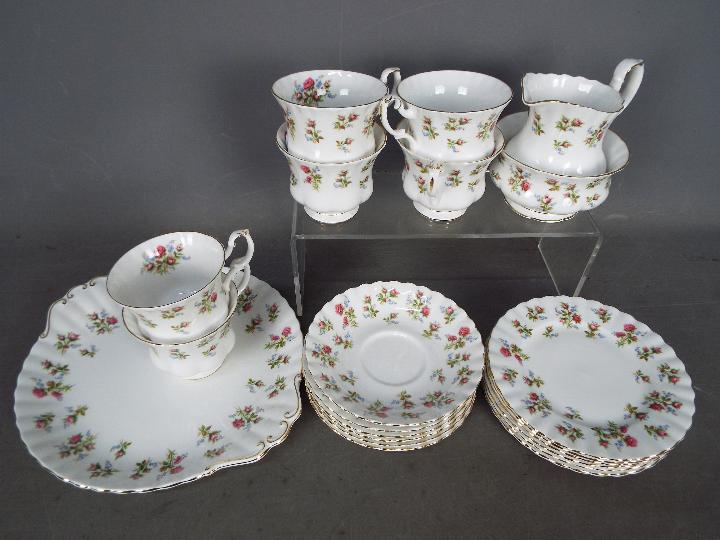 Royal Albert - A Winsome pattern tea service comprising six cups, six saucers, six side plates,