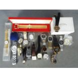 A quantity of wristwatches to include Swatch, Accurist, Rotary and similar.