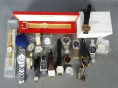 A quantity of wristwatches to include Swatch, Accurist, Rotary and similar.