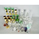 Mixed glassware including vintage Babycham glasses, Venetian glass, pair of glass candlesticks,