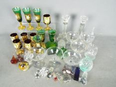 Mixed glassware including vintage Babycham glasses, Venetian glass, pair of glass candlesticks,