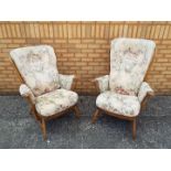 Ercol - Two Evergreen high back armchairs in Golden Dawn finish, one is design 913, the other 914.