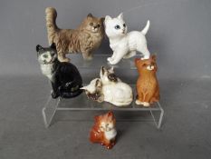 Beswick - Six figurines of kittens and cats, largest approximately 13 cm (h).