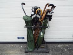 A cast iron, black painted stick / umbrella stand,