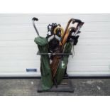 A cast iron, black painted stick / umbrella stand,