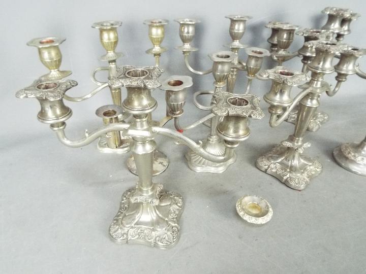 A collection of plated candelabrum. - Image 2 of 3