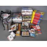 Lot to include CD's, DVD's, playing cards,